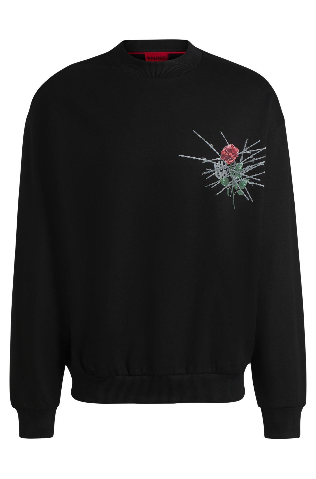 Cotton-terry relaxed-fit sweatshirt with seasonal prints Product Image