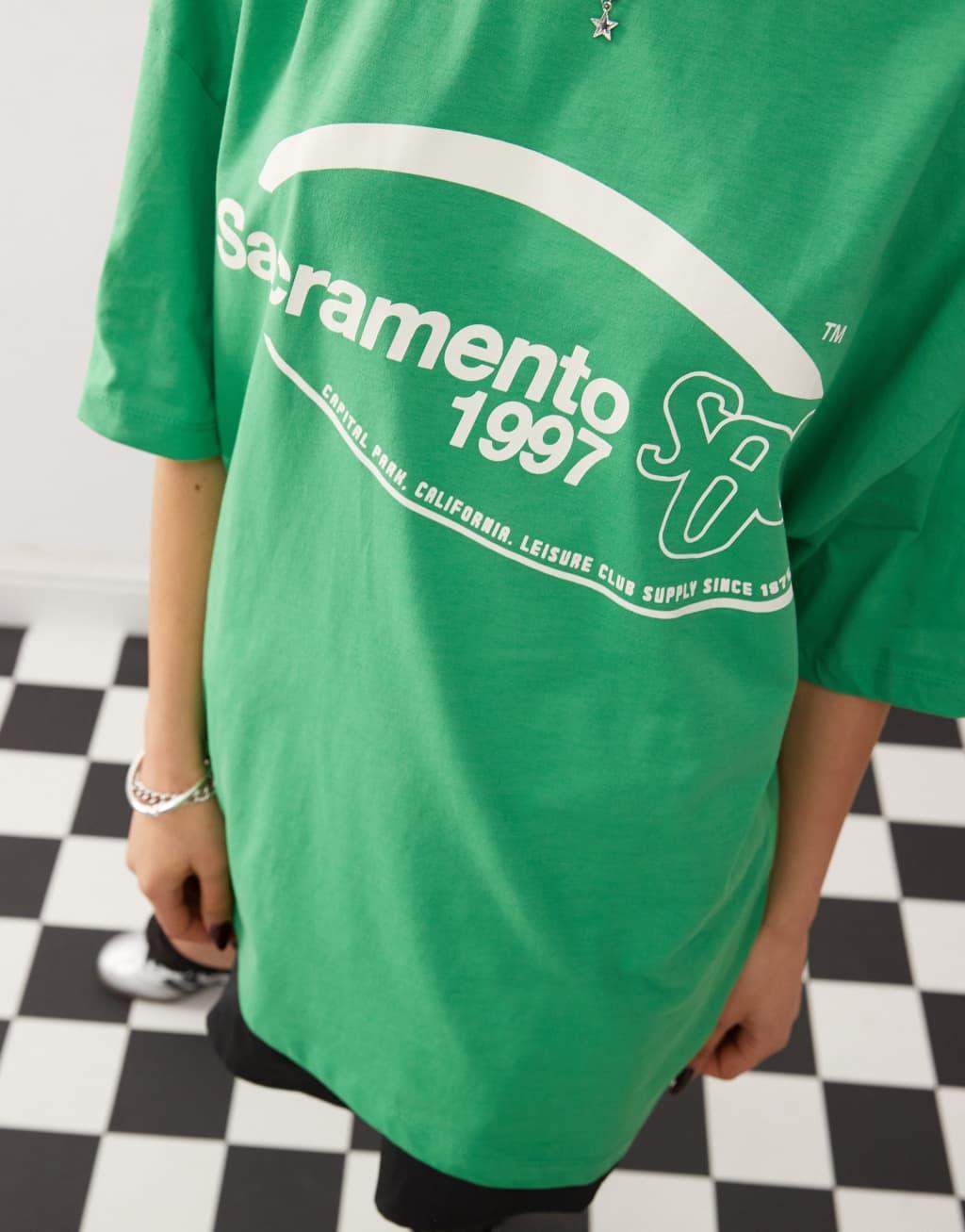 COLLUSION oversized t-shirt with Sacramento sports graphics in green  Product Image