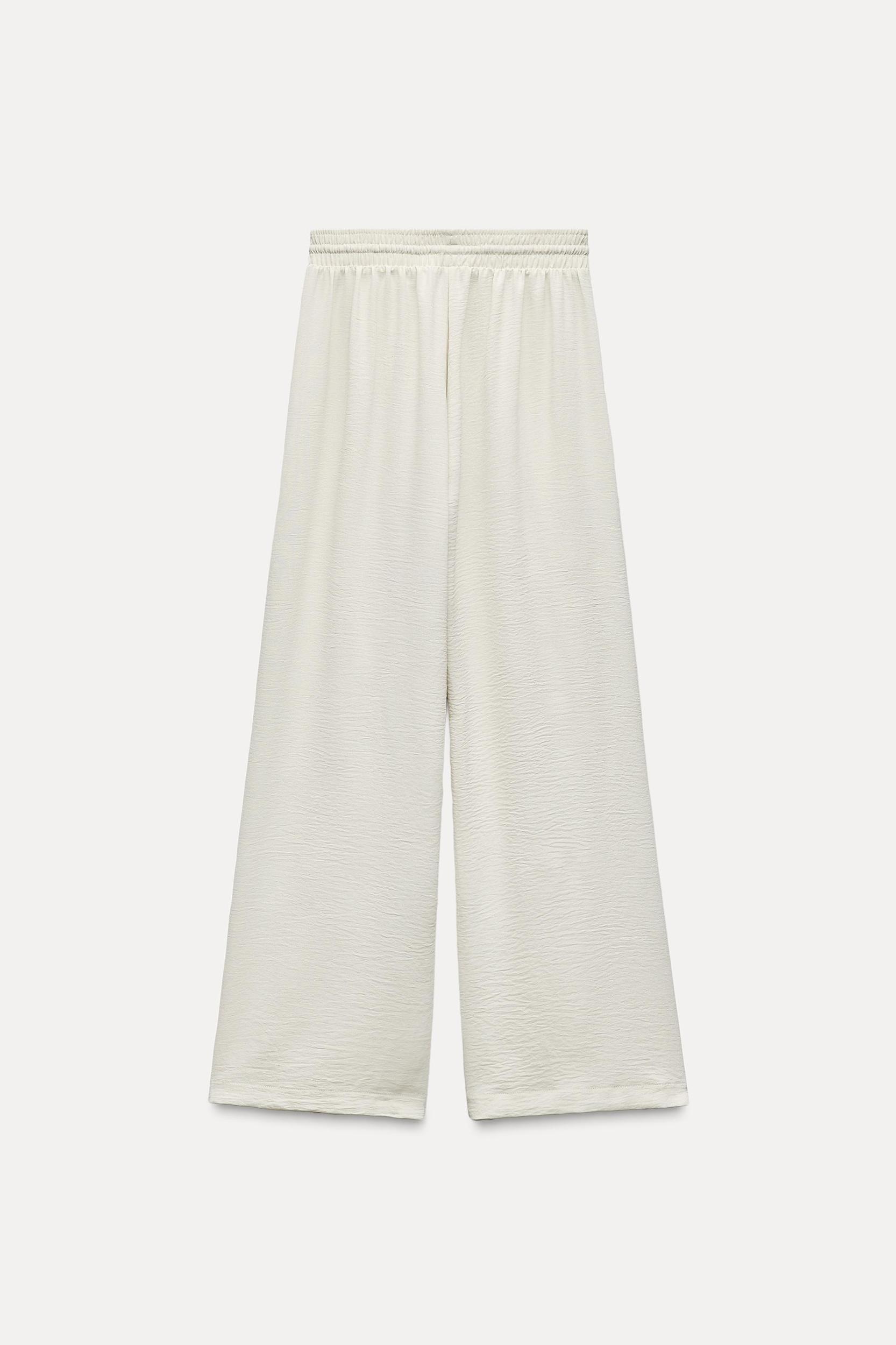 FLOWY PLEATED PANTS Product Image
