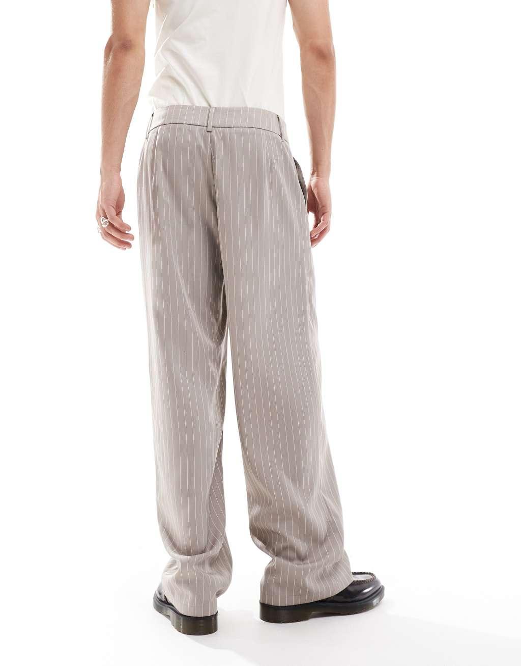 Reclaimed Vintage baggy tailored pants in beige pinstripe  Product Image
