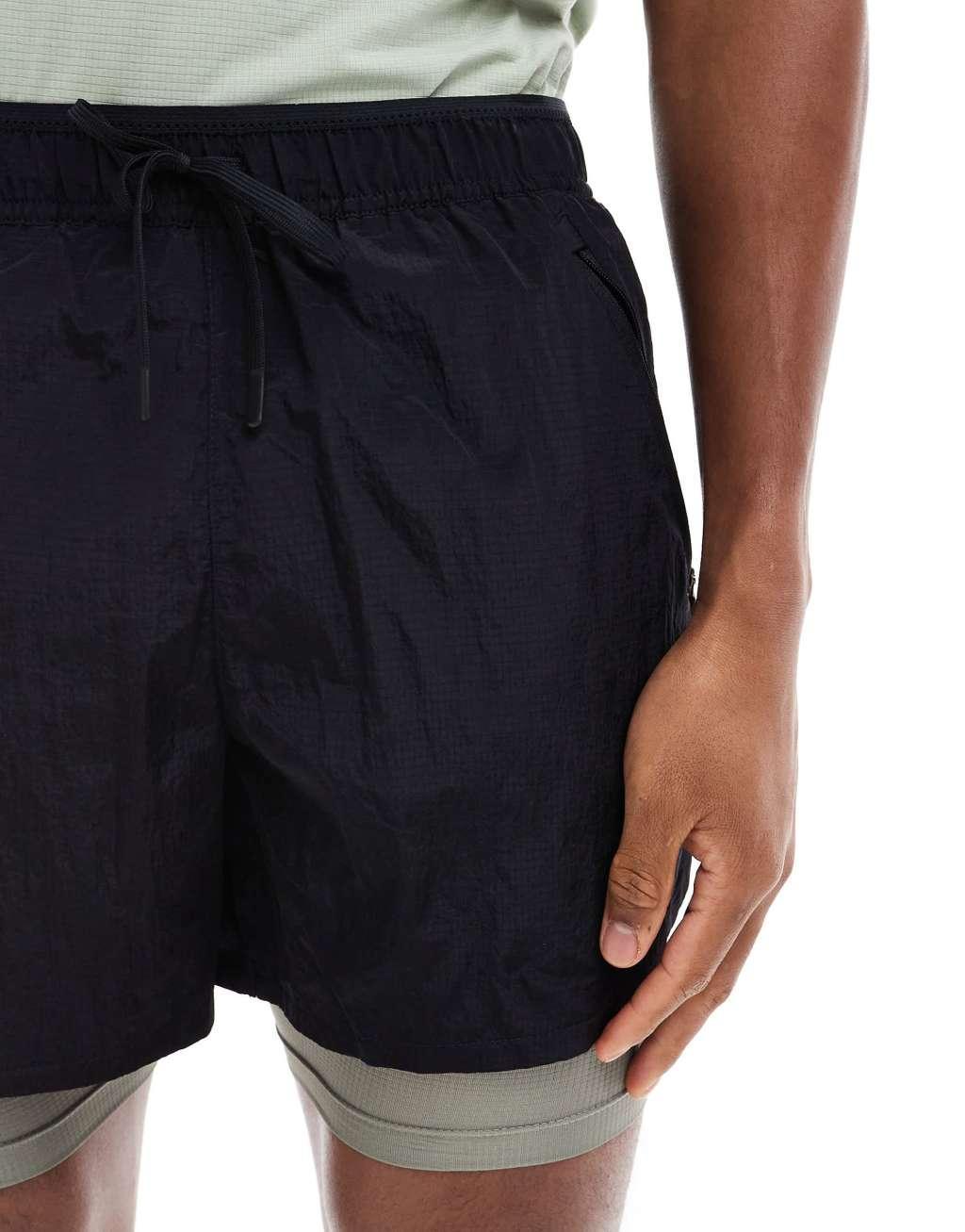 Nike Running Run Division Stride 5 inch 2 in 1 shorts in black Product Image