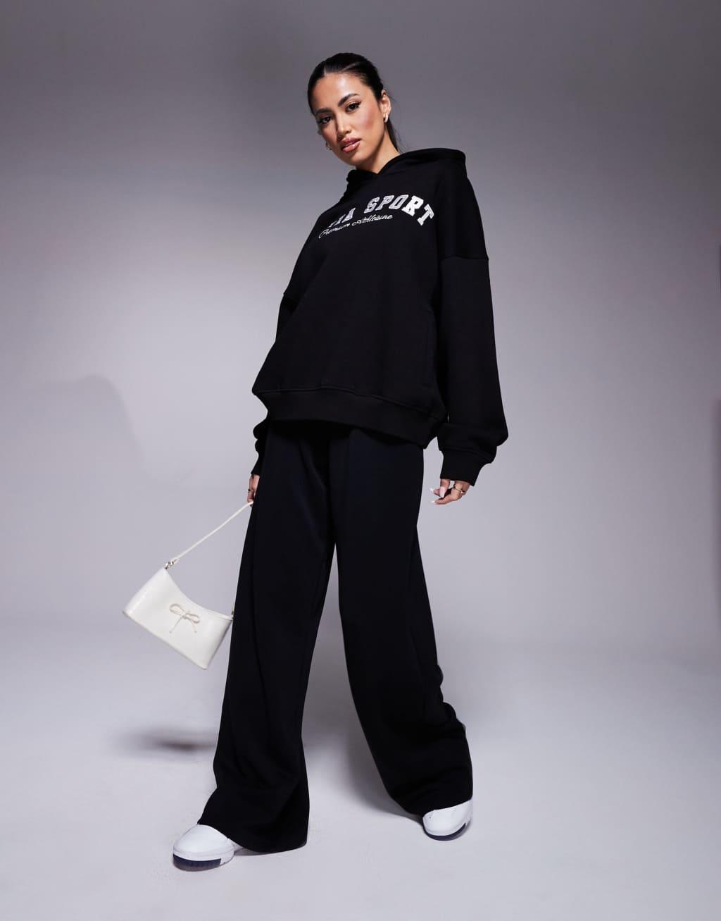 Kaiia sport embroidered logo oversized hoodie in black and white Product Image