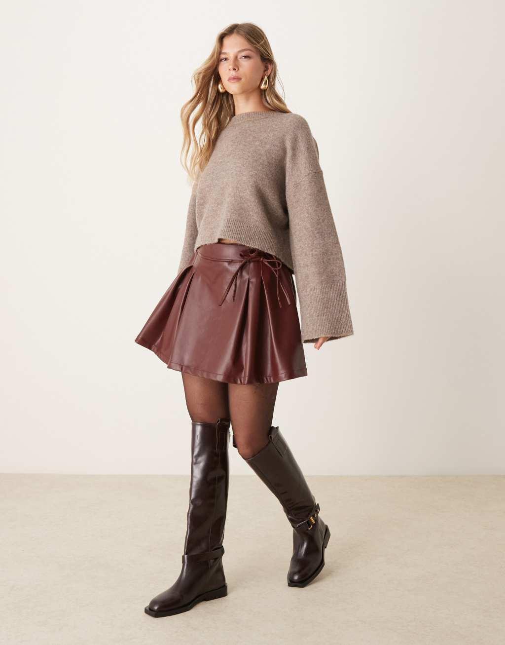 ASOS DESIGN leather look pleated mini skirt in burgundy Product Image