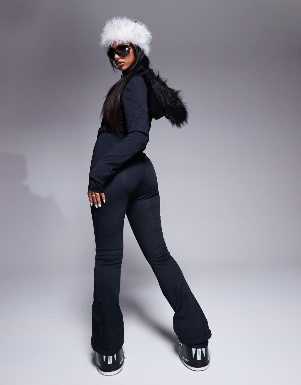 4505 Ski belted ski suit with slim kick legs and faux fur hood in black  Product Image