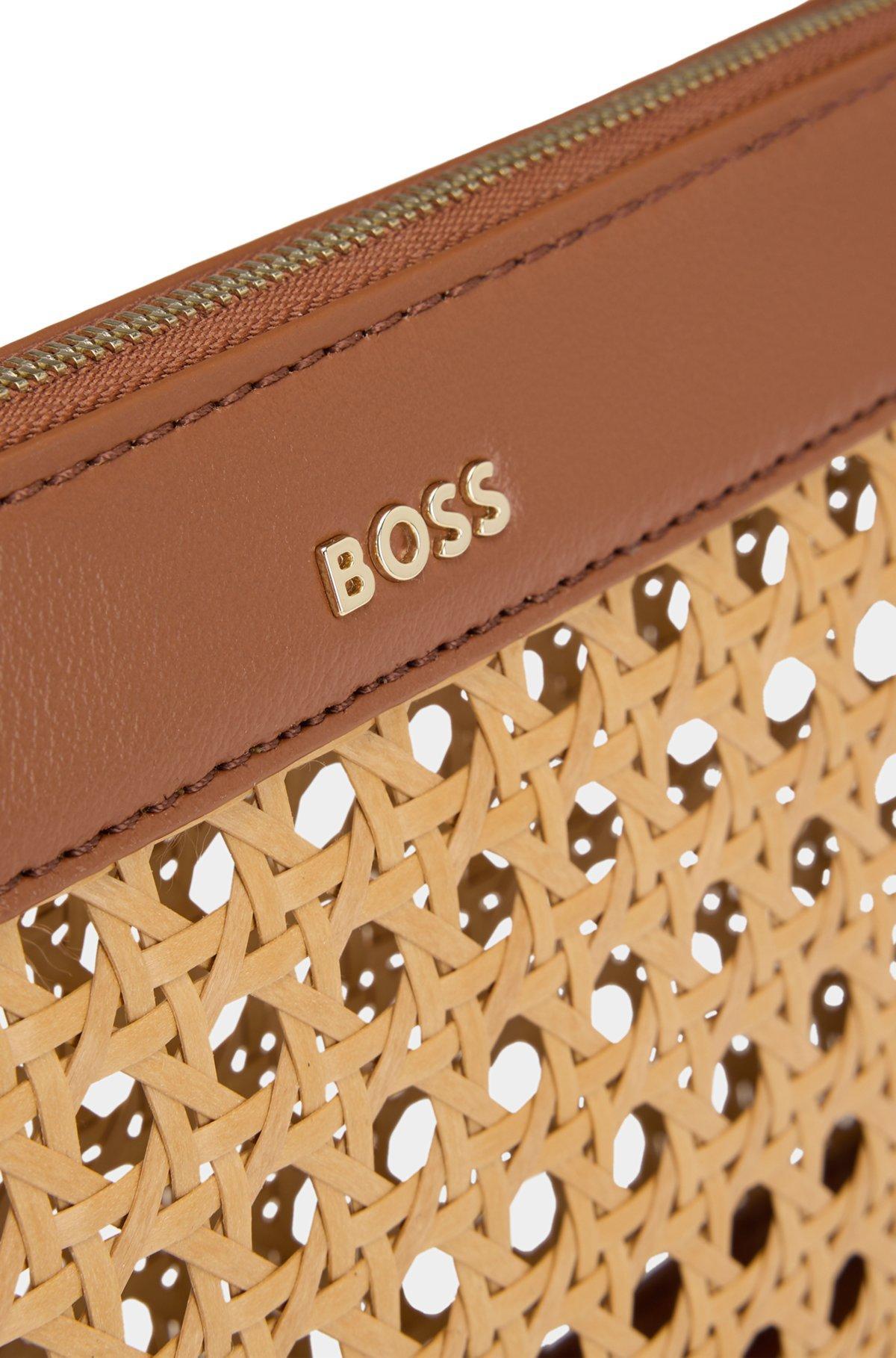 Woven shoulder bag with partially detachable handle Product Image