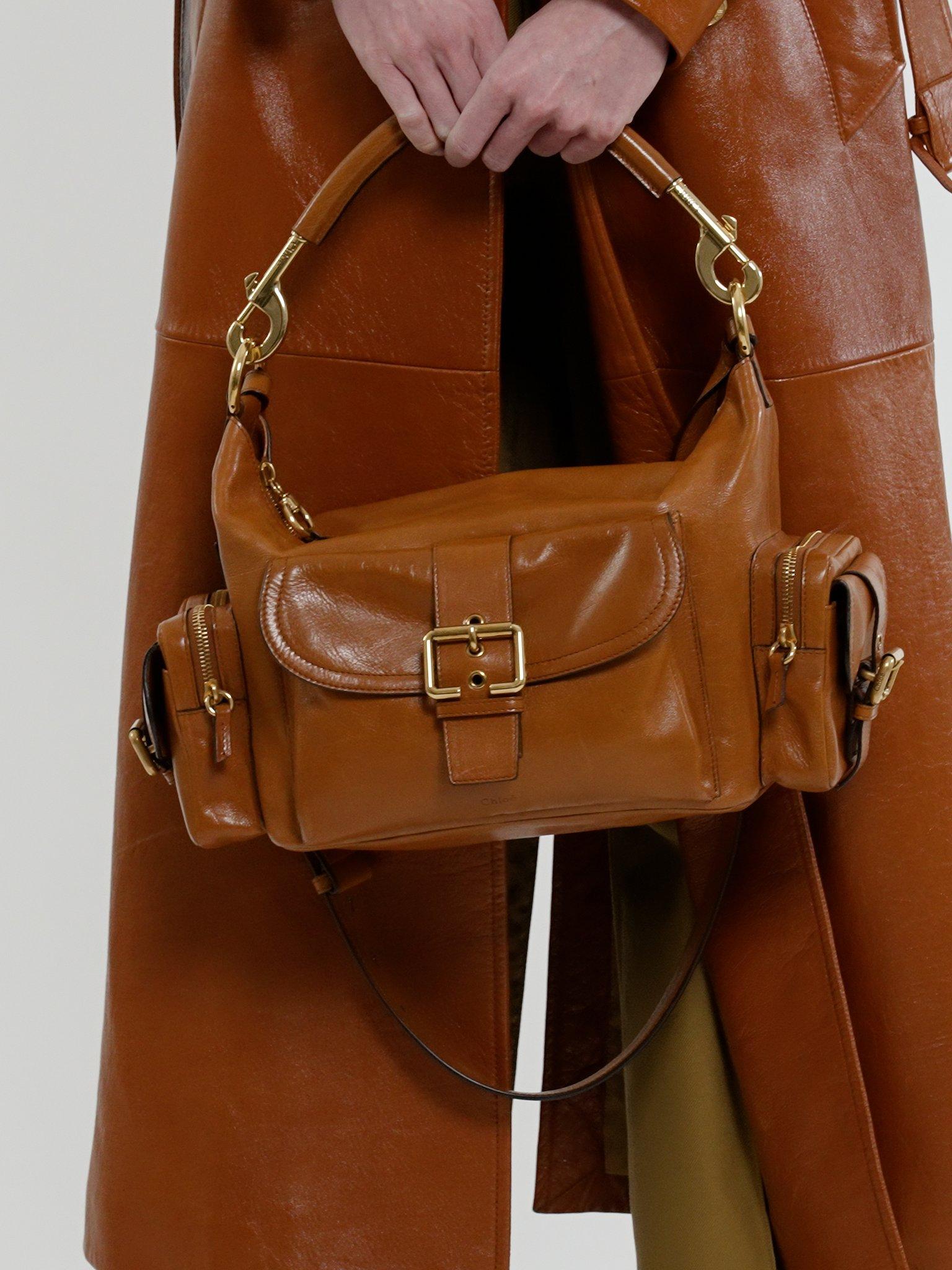 Camera bag in shiny leather Product Image