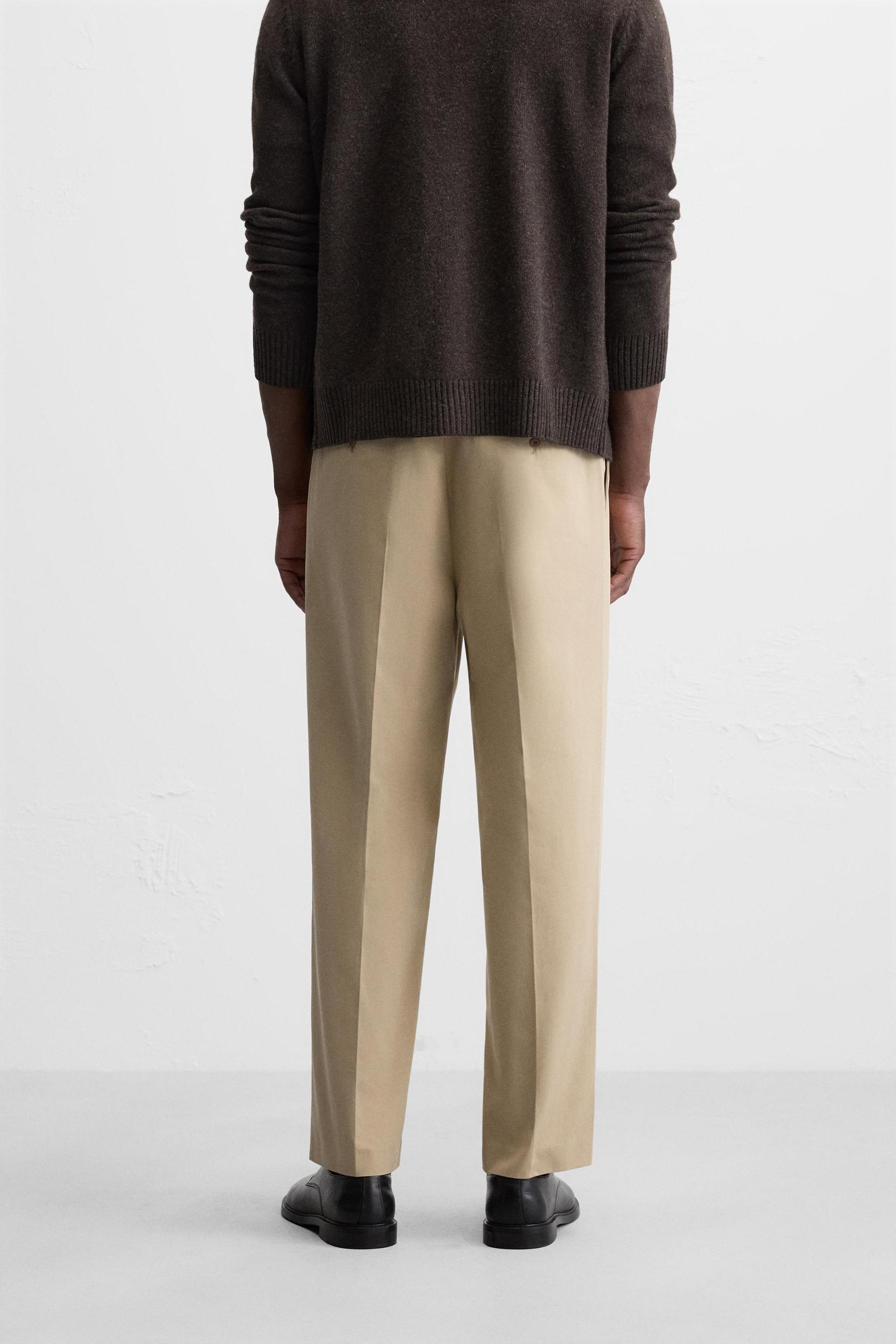 PLEATED STRAIGHT FIT PANTS Product Image