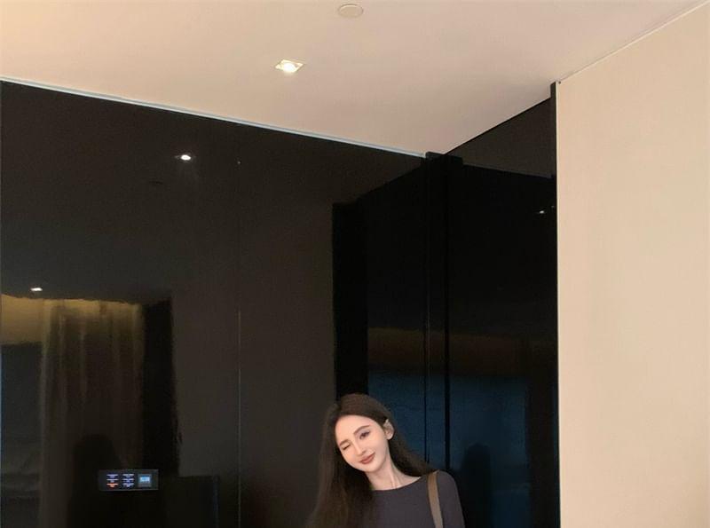 Long-Sleeve Plain Loose-Fit Knit Top / Striped Loose-Fit Pants Product Image