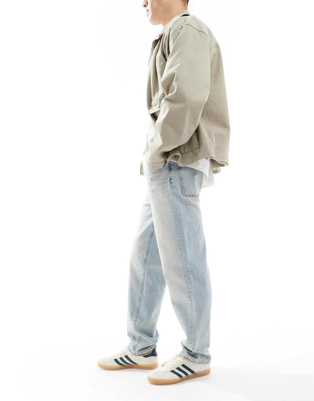 ASOS DESIGN straight leg jeans in light wash blue  Product Image