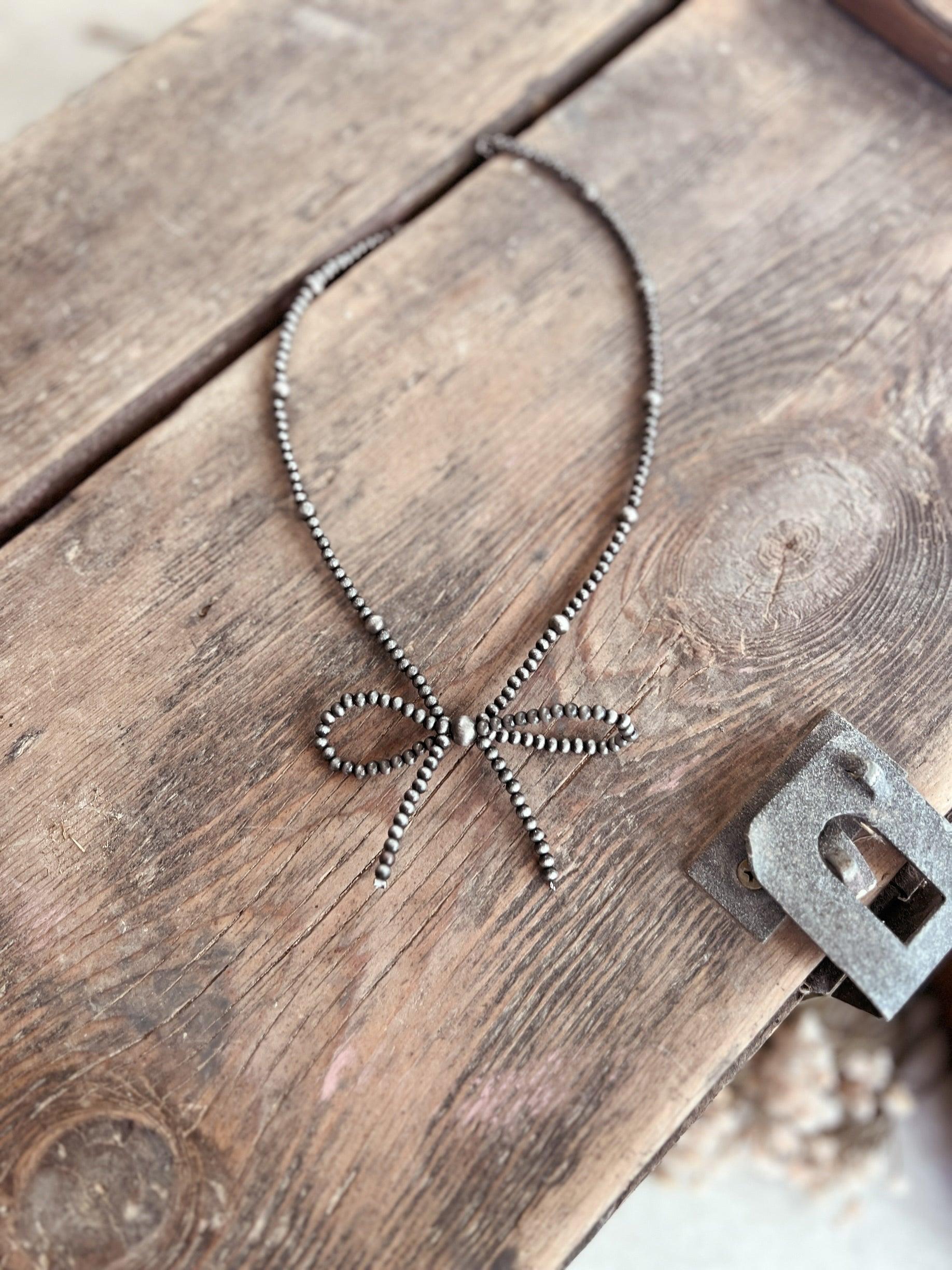 Silver Navajo Inspired Beaded Bow Necklace Product Image