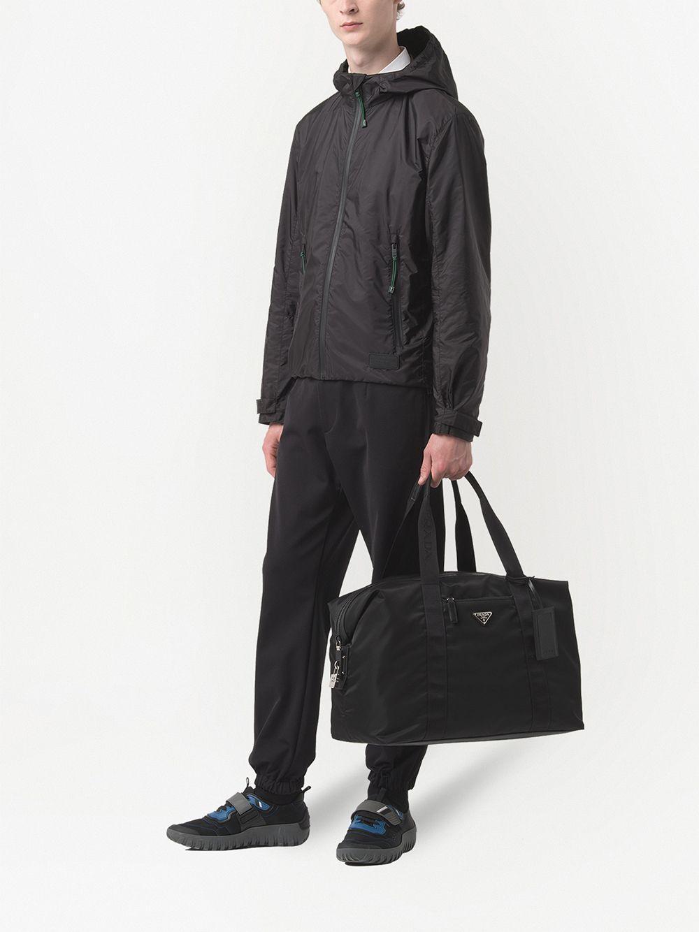 Re-Nylon triangle logo holdall bag Product Image