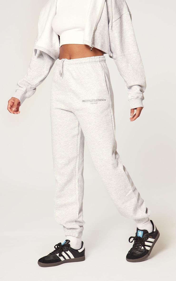 PRETTYLITTLETHING Grey Marl Copy right Graphic Sweatpants Product Image