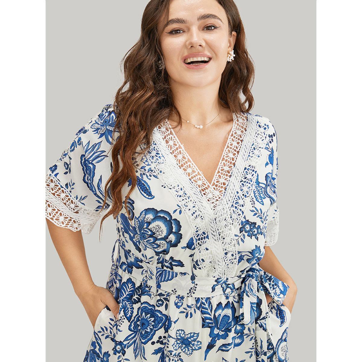 Plus Size Navy Floral Belted Pocket Lace Trim Wrap Jumpsuit Women Vacation Short sleeve V-neck Dailywear Loose Jumpsuits BloomChic 30/6X Product Image