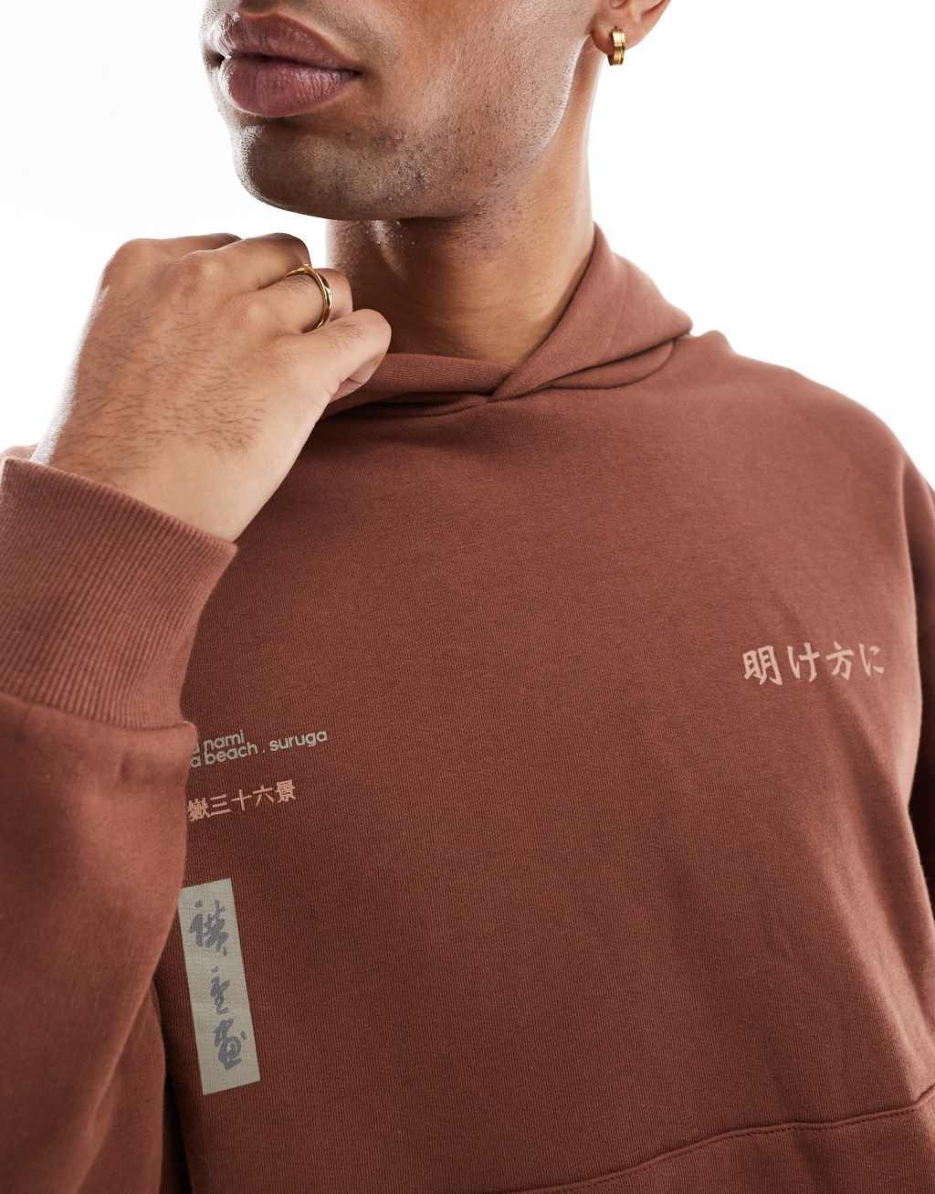ASOS DESIGN boxy oversized hoodie with back print in brown Product Image