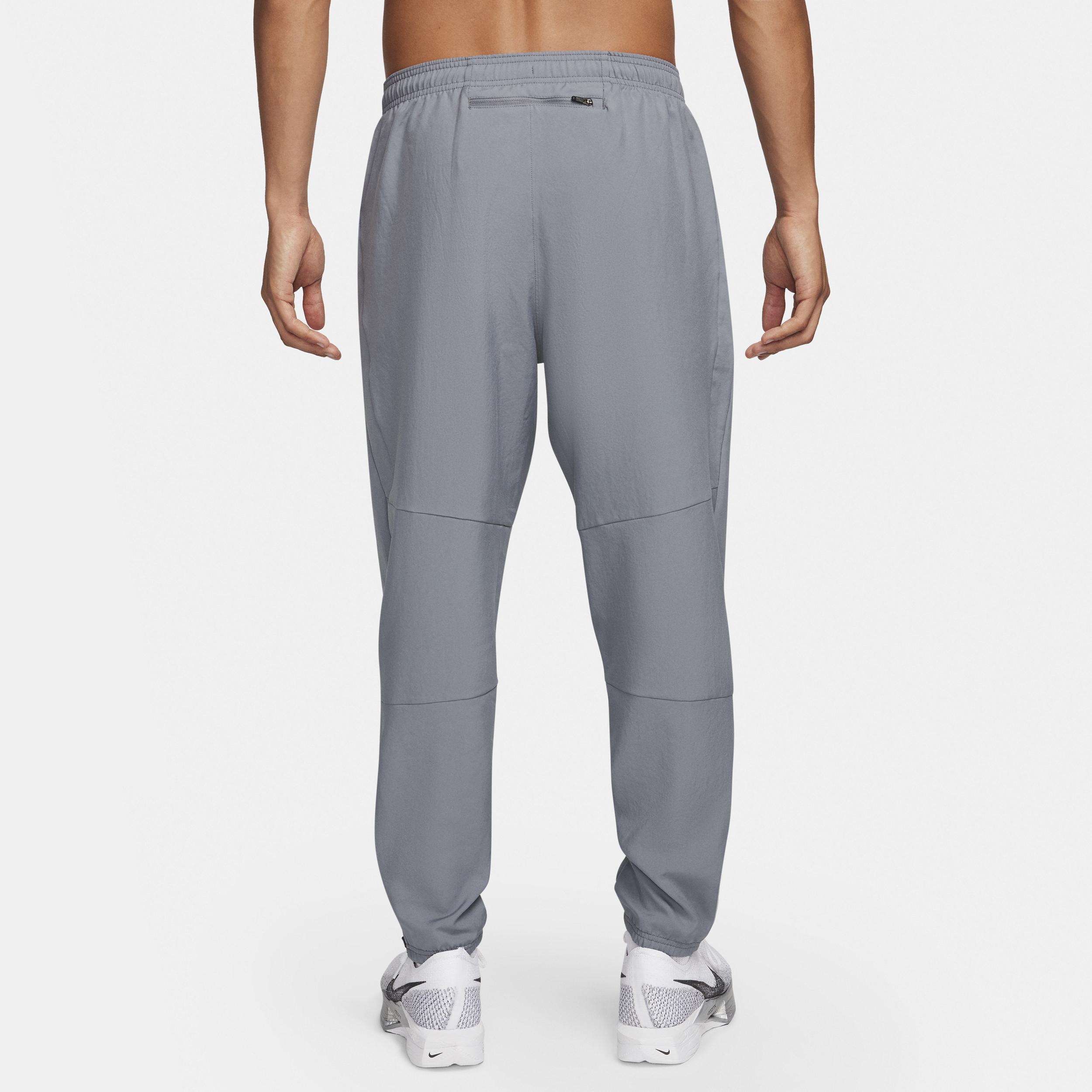 Nike Men's Challenger Dri-FIT Woven Running Pants in Grey/Smoke Grey Size Medium Polyester Product Image