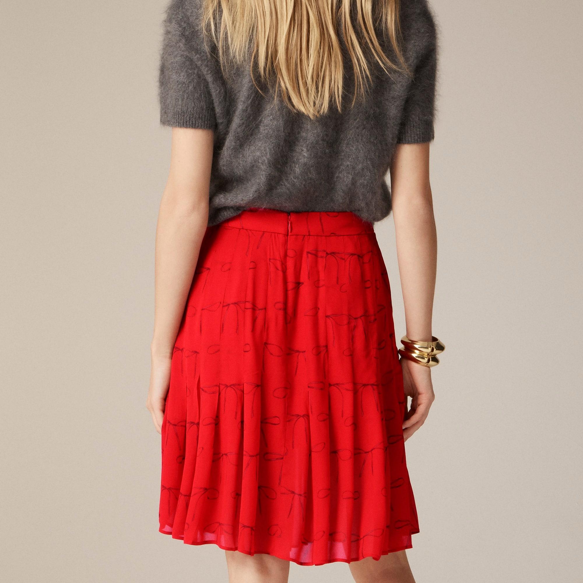 Pleated knee-length skirt in bow-print viscose chiffon Product Image