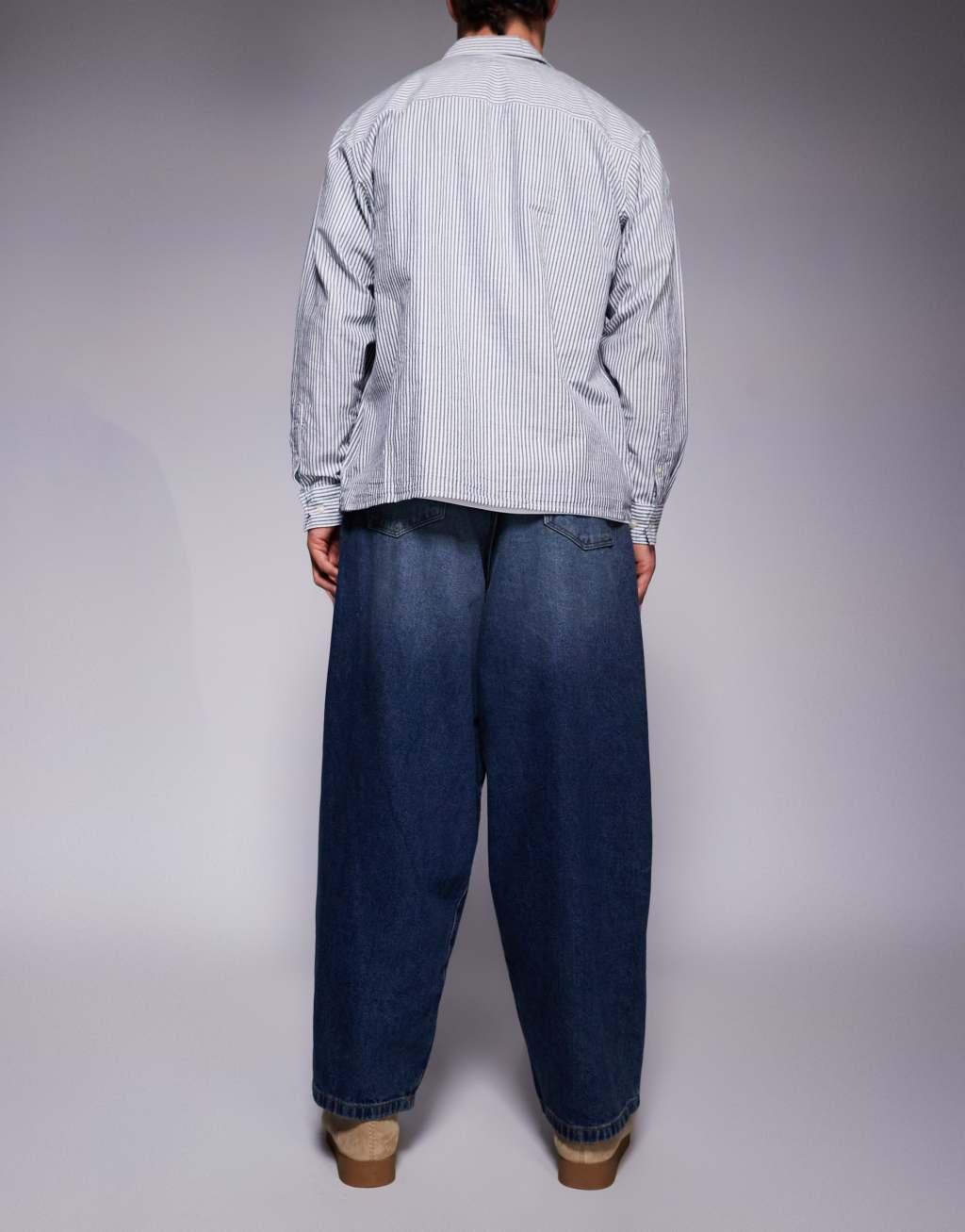 ASOS DESIGN oversized baggy fit jeans in vintage dark wash blue Product Image