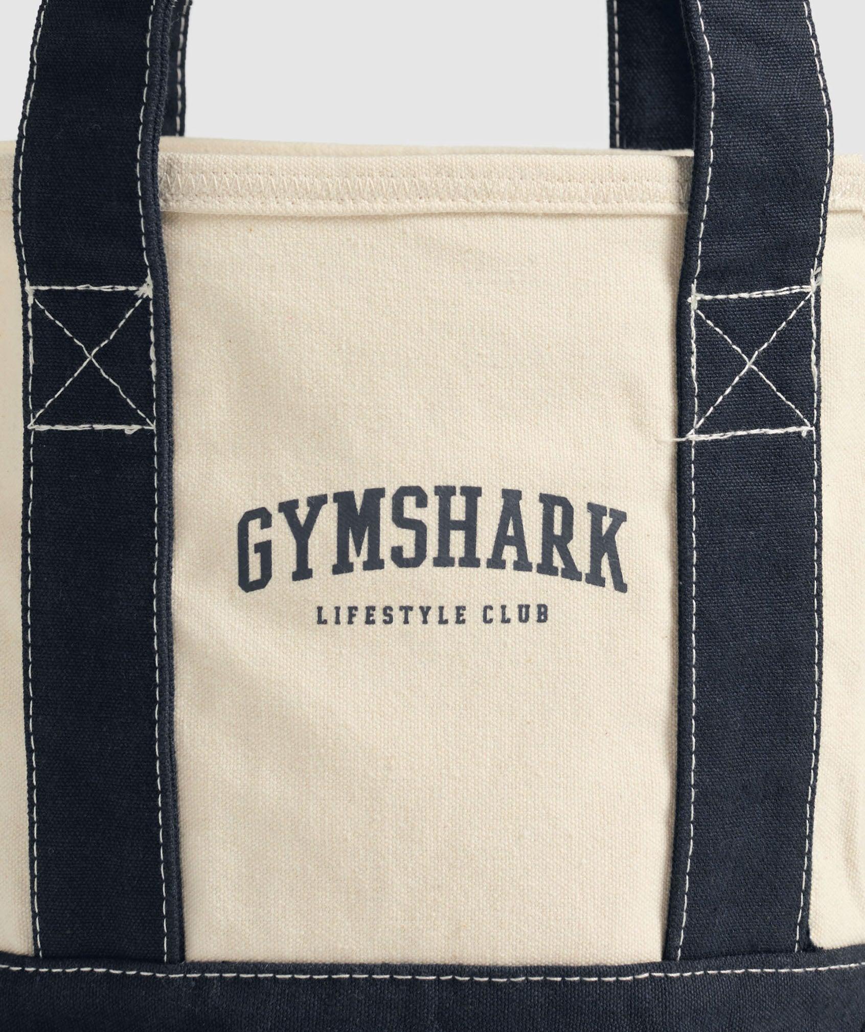 Gymshark Collegiate Mini Tote - Oat White/Heavy Blue Unisex Product Image