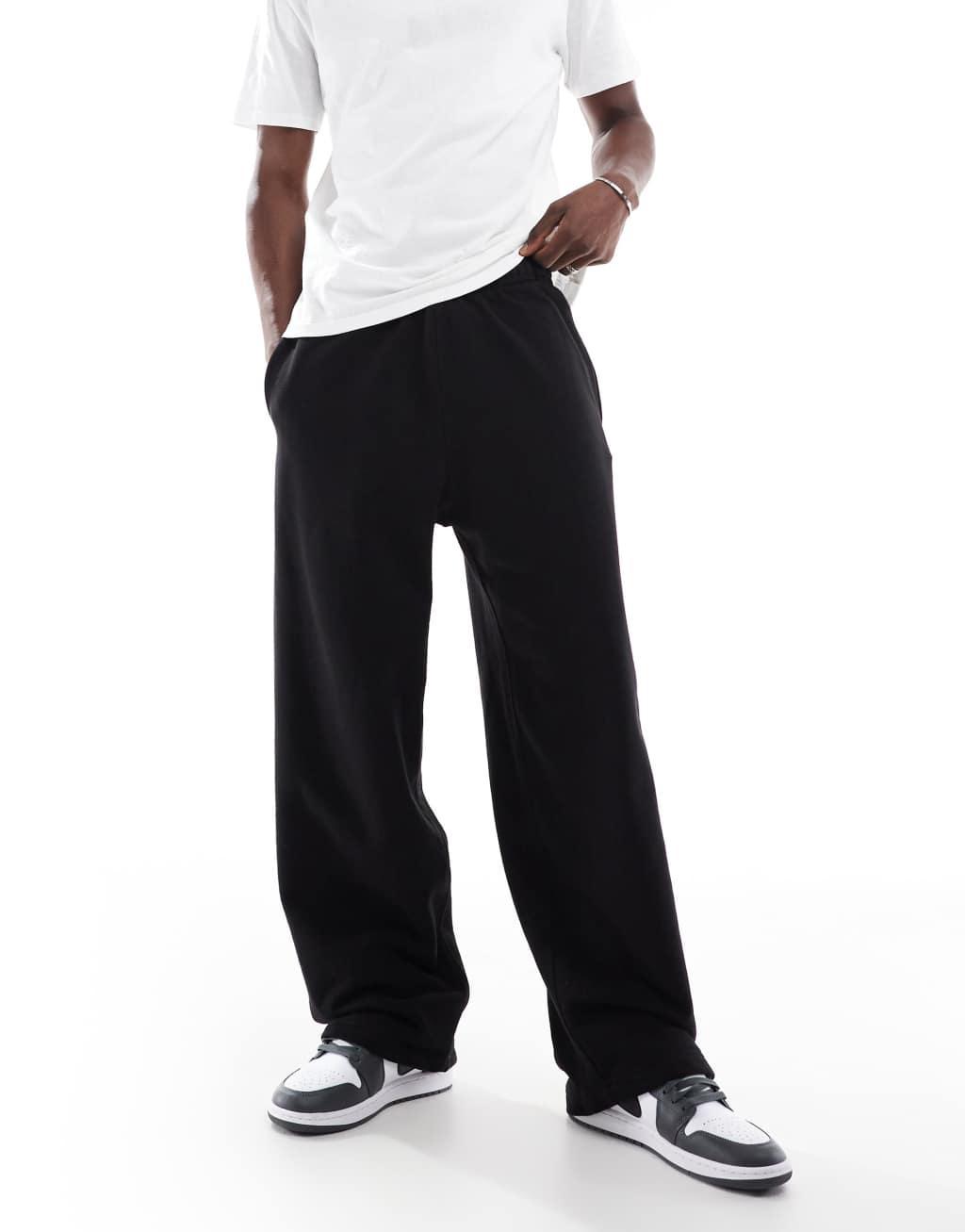 Pull&Bear baggy sweatpants in black Product Image