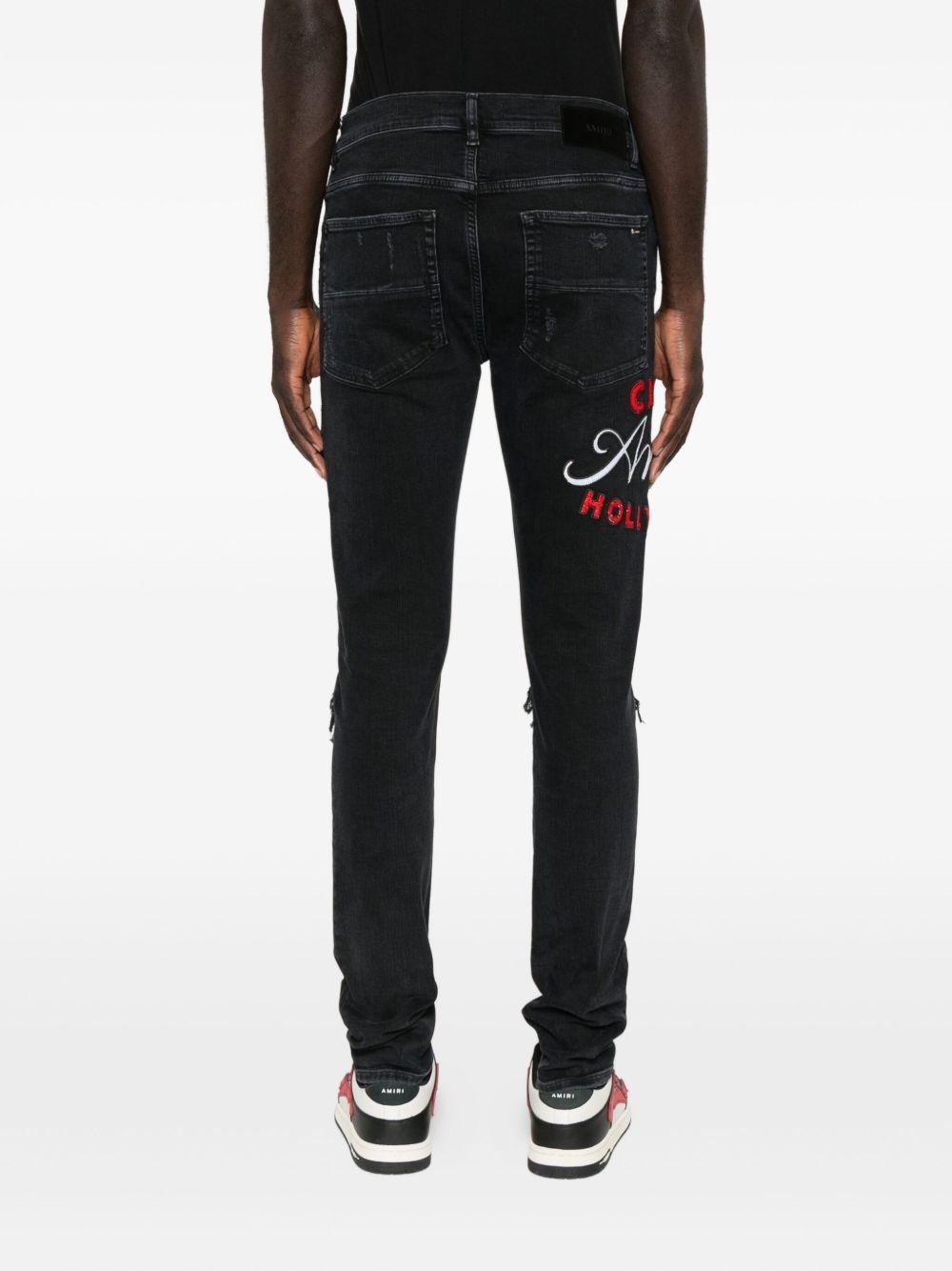embroidered distressed jeans Product Image