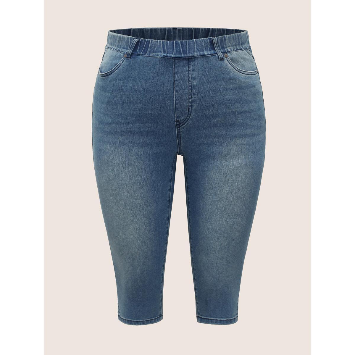 Plus Size Medium Wash Elastic Waist Pull-on Jegging Jeans Women Blue Casual Slit High stretch Slanted pocket Jeans BloomChic 12/L Product Image