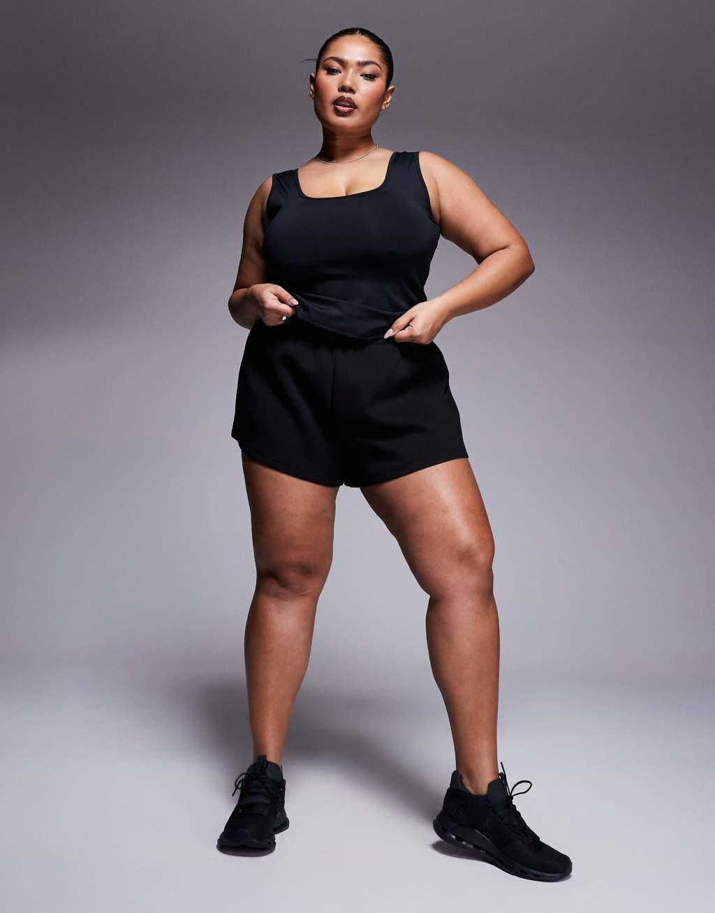 4505 Curve Icon scoop neck slightly cropped training tank top in black  Product Image