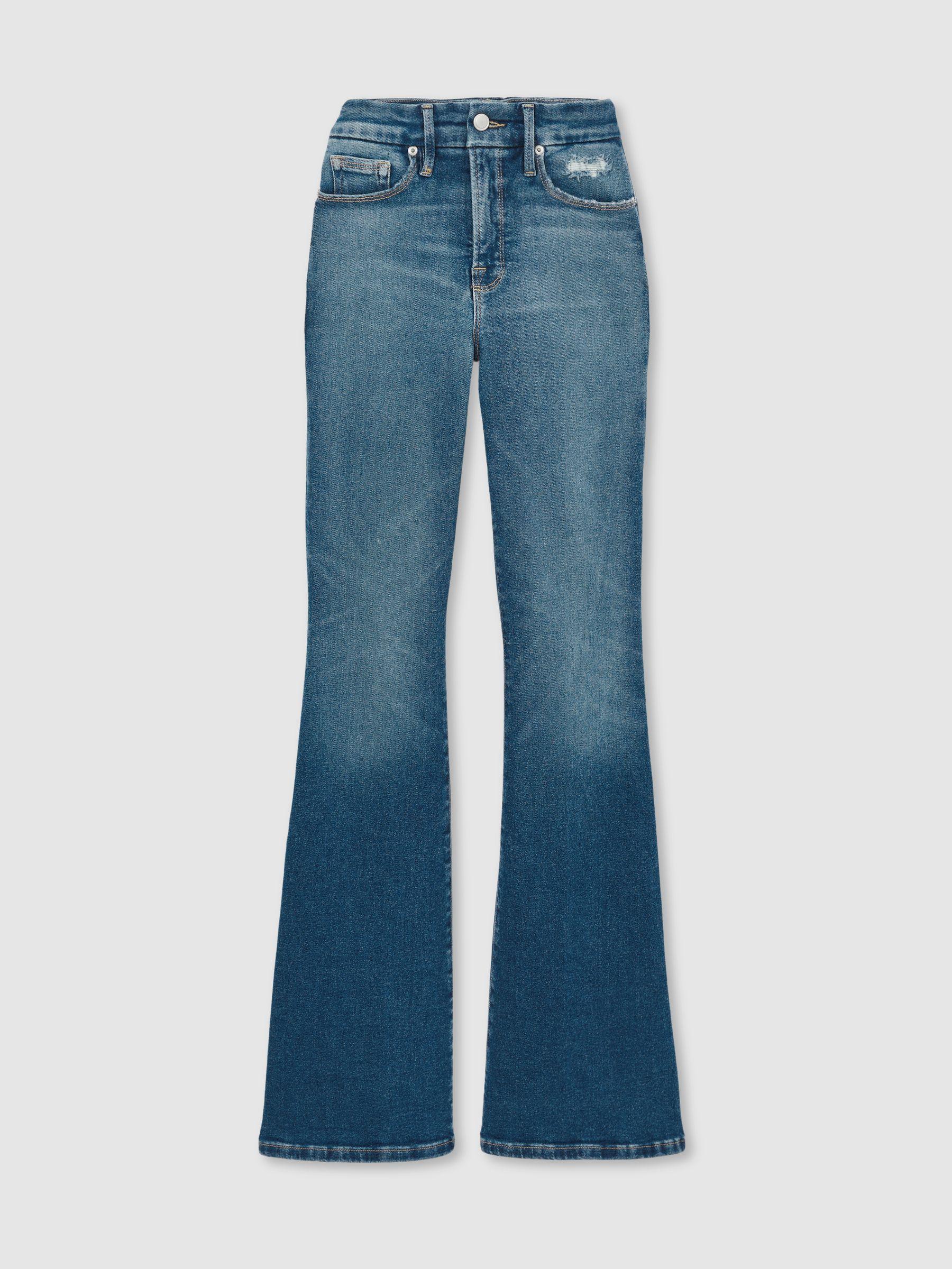 Good American Flared Distressed Jeans in Dark Indigo Product Image