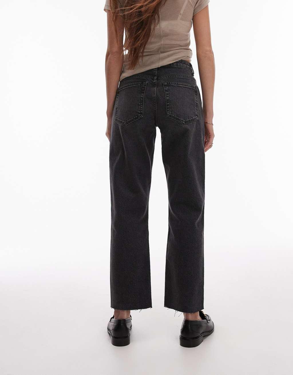 Topshop cropped mid rise straight jeans with raw hems in washed black Product Image