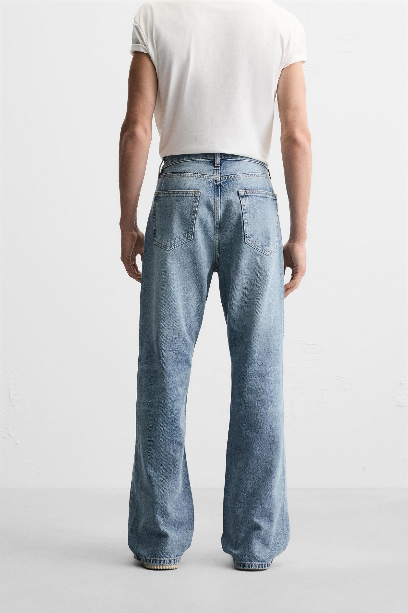 RIPPED FLARE FIT JEANS Product Image