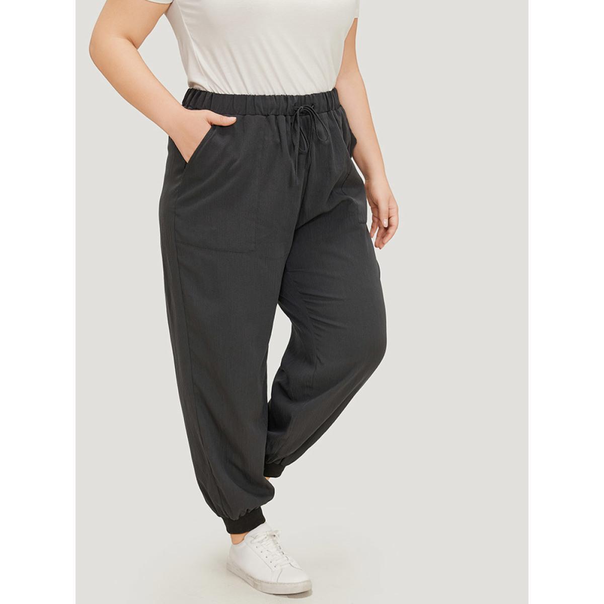 Plus Size Plain Drawstring High Waist Pocket Carrot Pants Women Black Casual High Rise Dailywear Pants BloomChic 30/6X Product Image