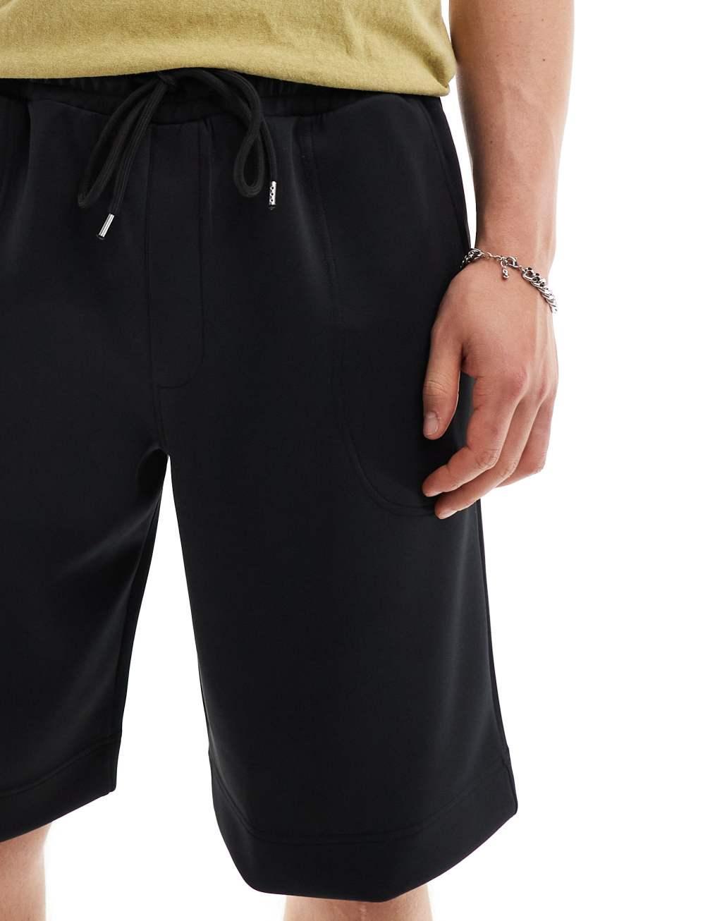 ASOS DESIGN scuba shorts in black Product Image