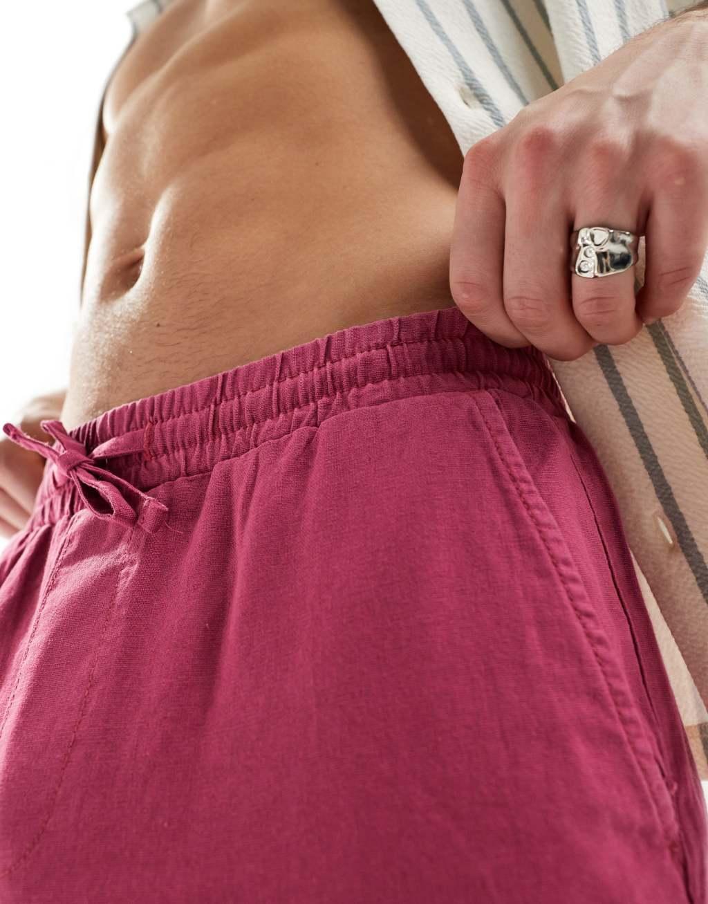 ASOS DESIGN baggy linen mix pants with elastic waist in pink  Product Image