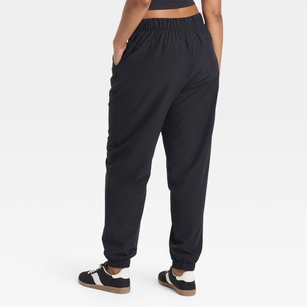Womens High-Rise Winter Woven Lined Joggers - All In Motion Black Product Image