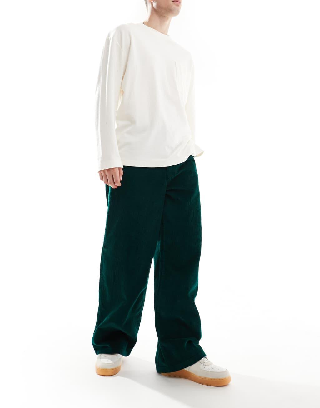 ASOS DESIGN super baggy cord pants in dark green  Product Image