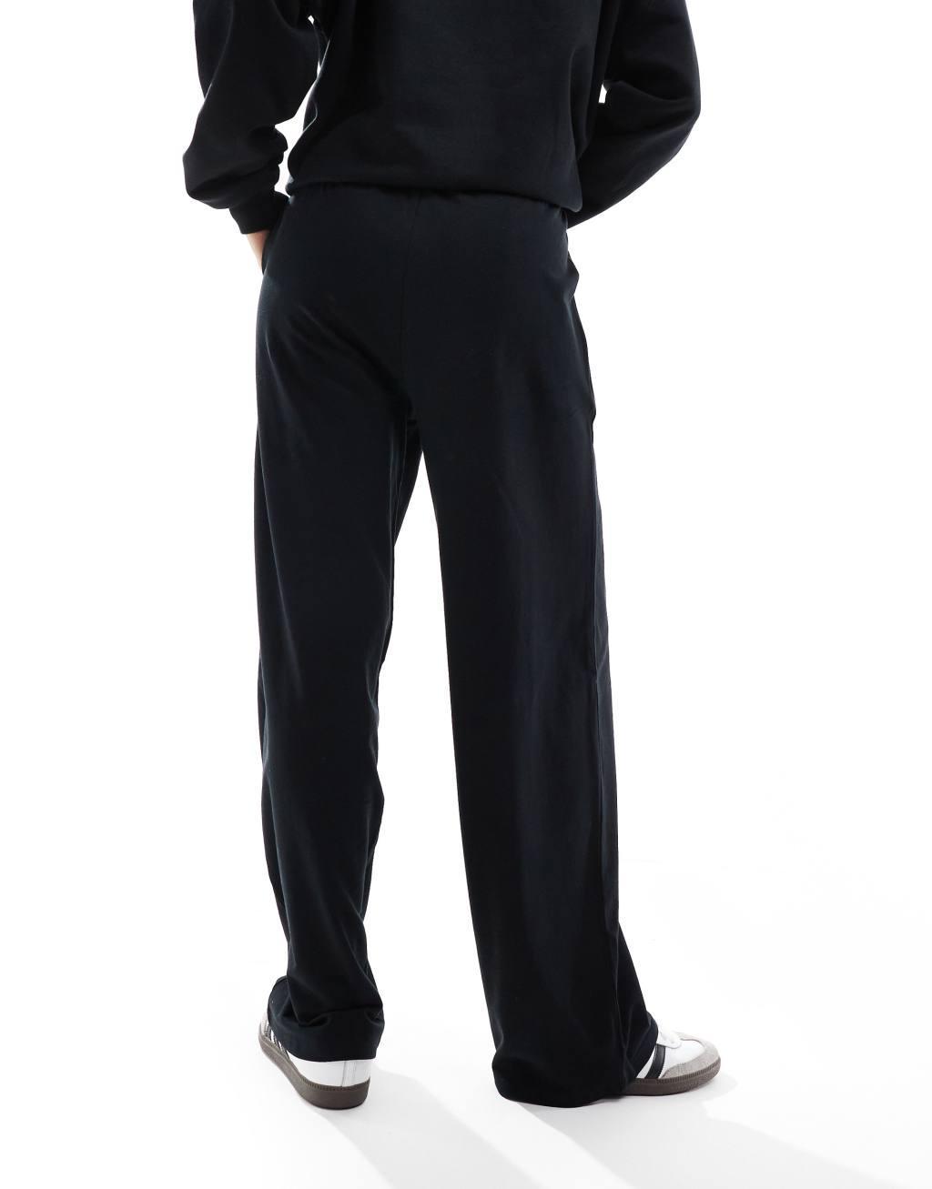 ASOS DESIGN straight leg sweatpants in black Product Image
