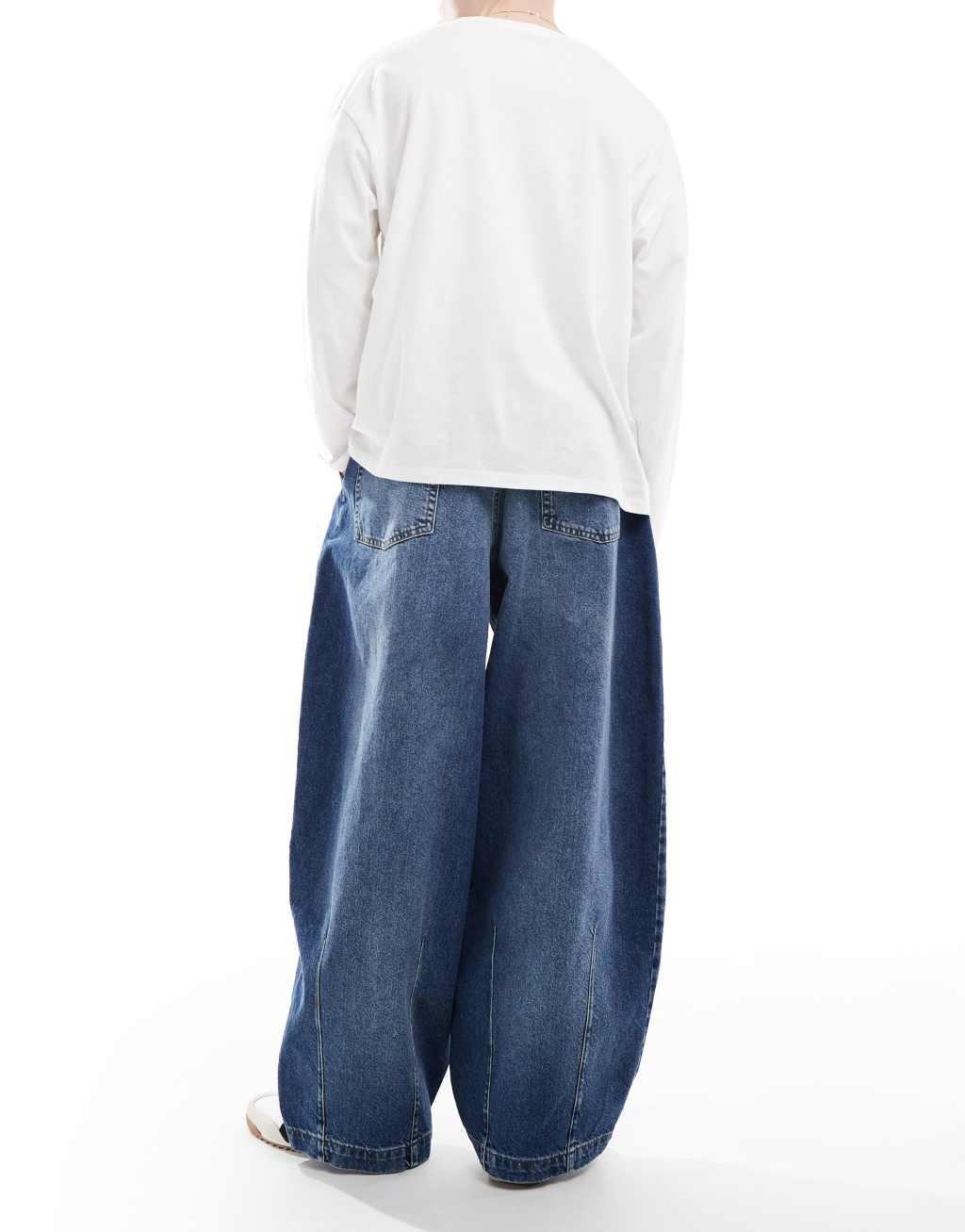 ASOS DESIGN baggy balloon jeans with tint in mid wash blue Product Image