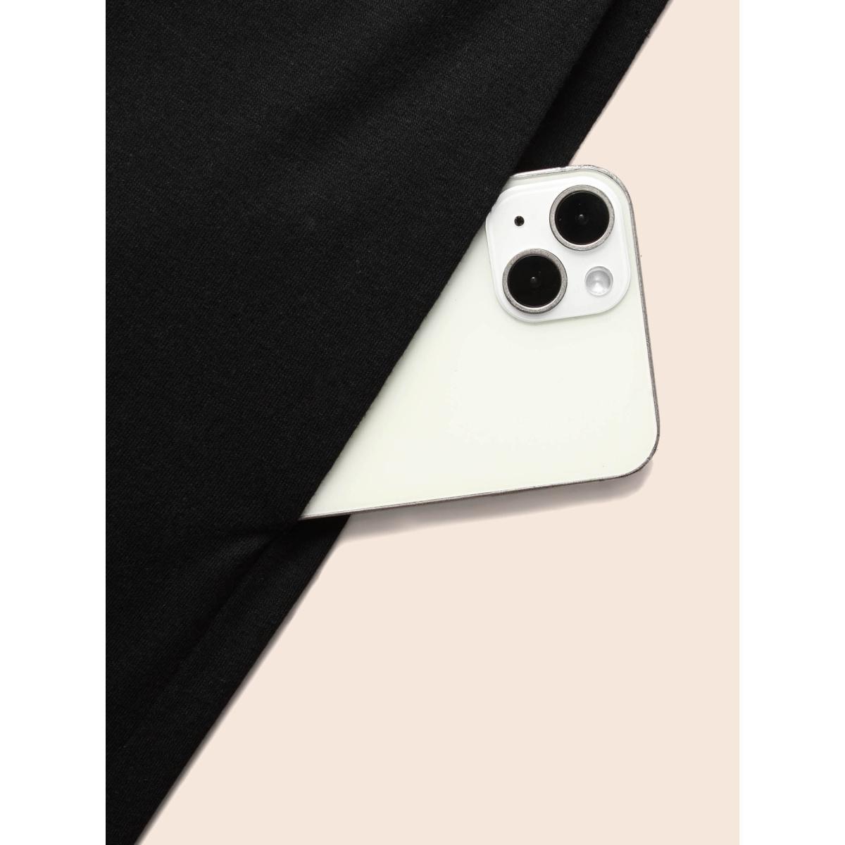 Plus Size Black Overlap Collar Metal Detail Belted Jumpsuit Women Elegant Sleeveless Overlap Collar Everyday Loose Jumpsuits BloomChic 22-24/3X Product Image