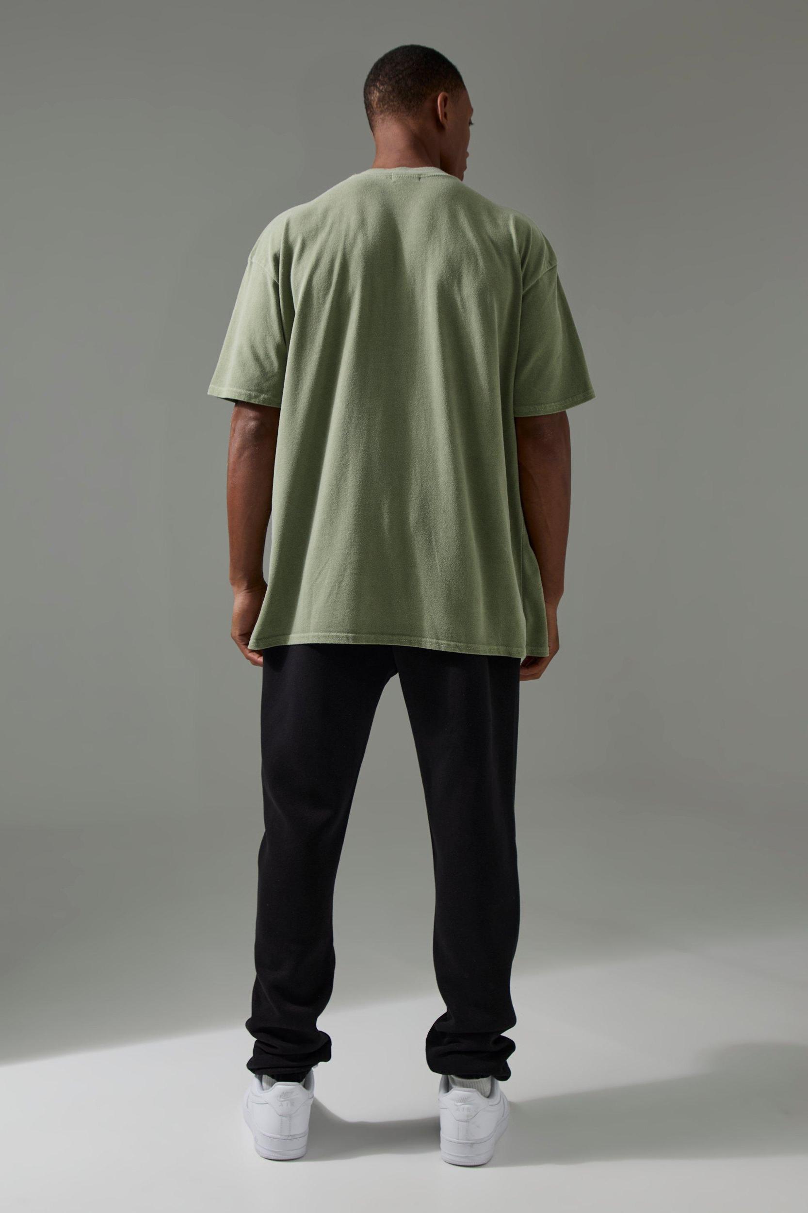 Man Active Washed One More Rep Oversized T-shirt | boohooMAN USA Product Image