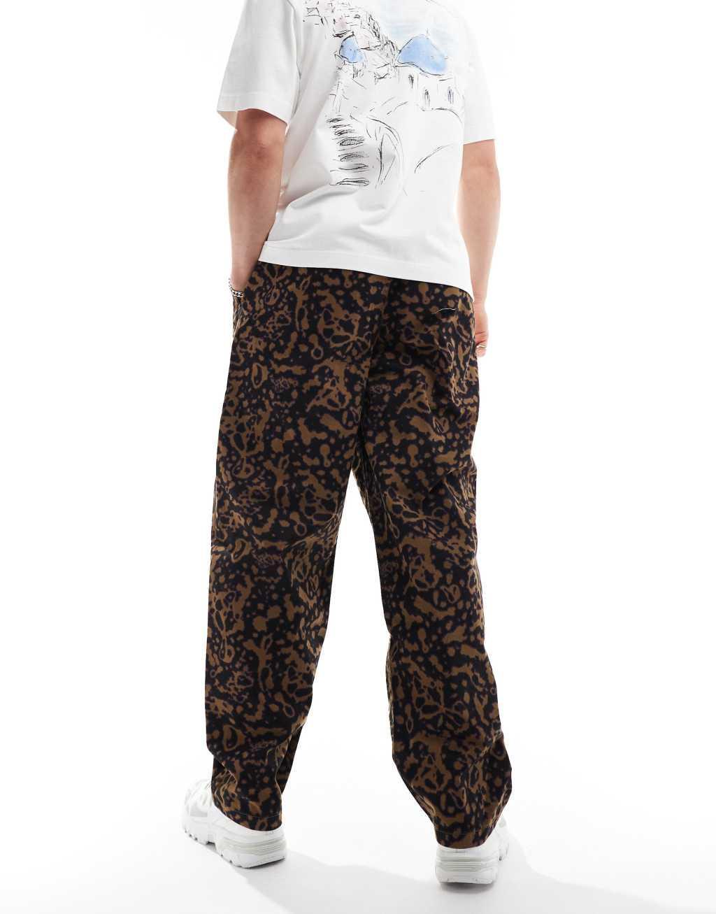 Vans range baggy tapered elastic waist pants in multi Product Image