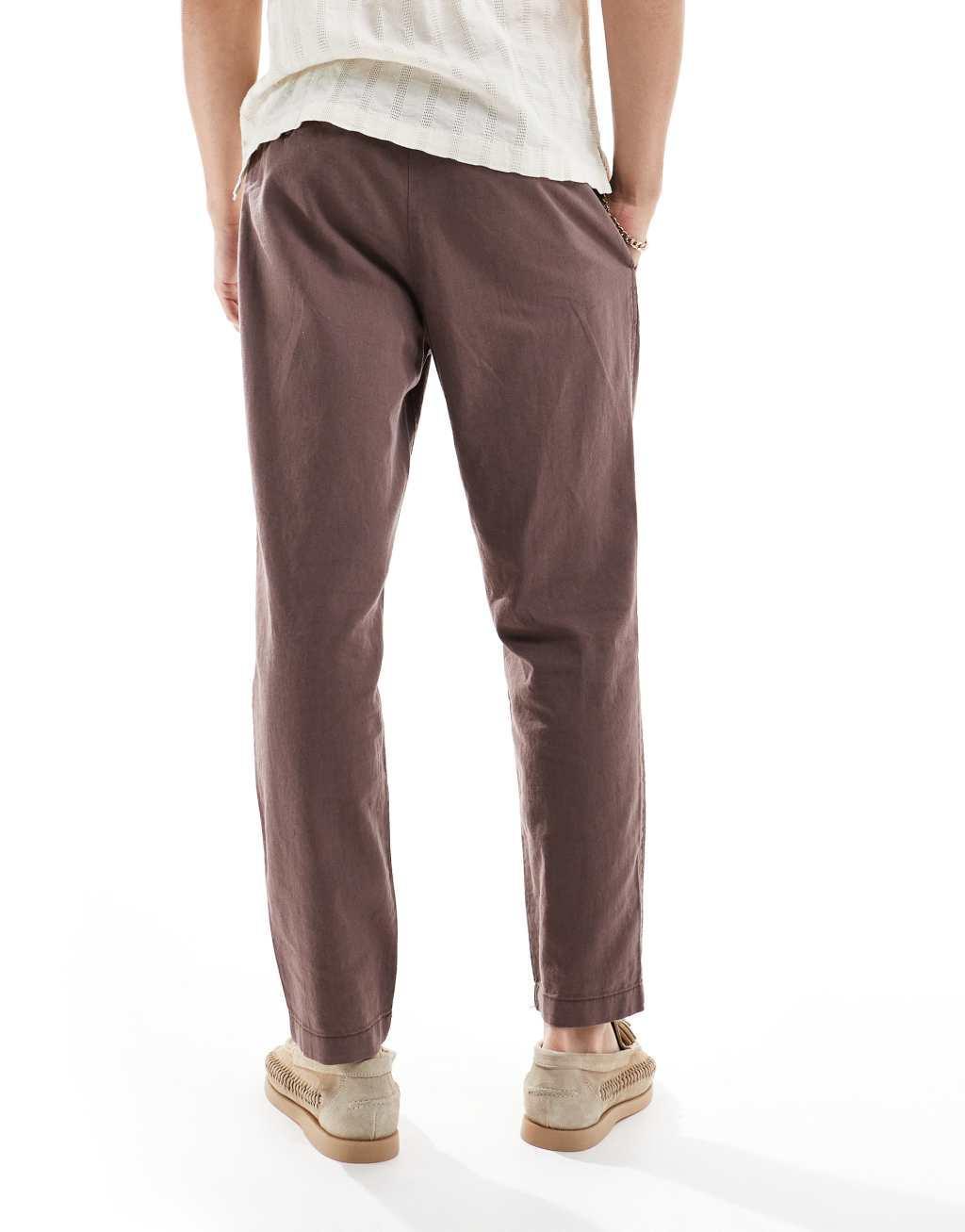 ASOS DESIGN wide pleated linen mix chino pants in brown Product Image