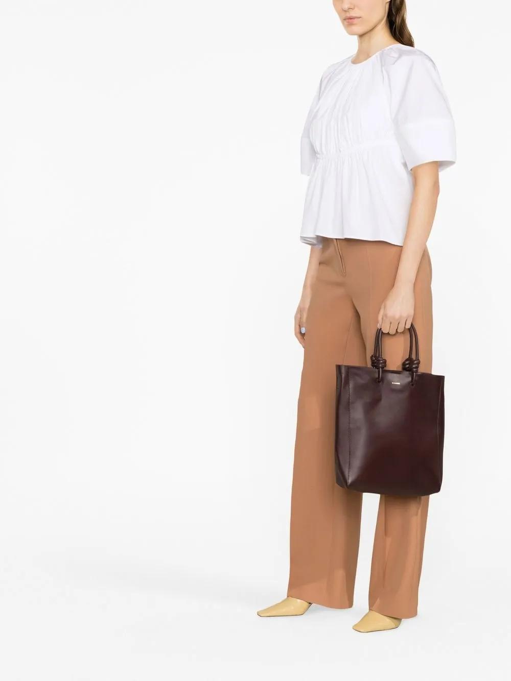 JIL SANDER Peplum Waist Cut-out Top In White Product Image