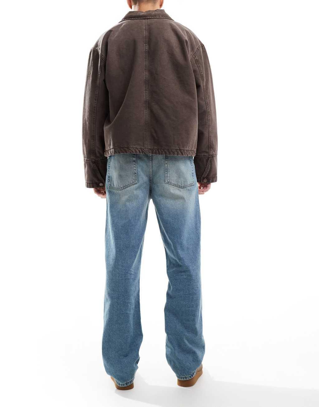 ASOS DESIGN straight leg jeans in mid blue wash Product Image