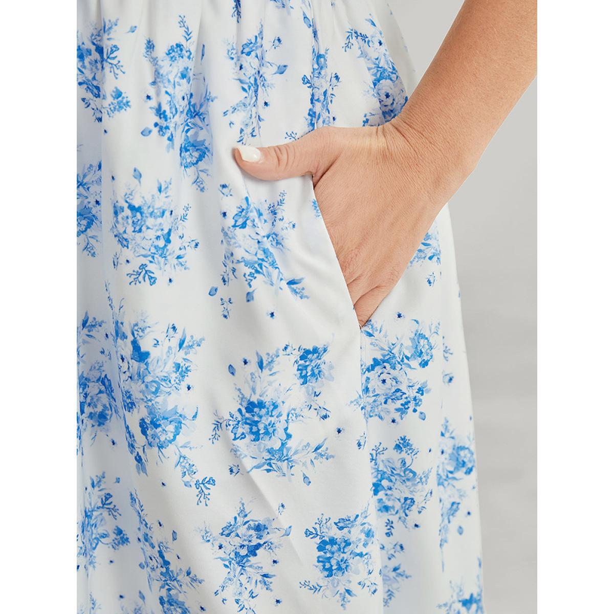 Plus Size Floral Ruffle Trim Button Detail Pocket Shirred Waist Dress Blue Women Elegant Lined V-neck Short sleeve Curvy Midi Dress BloomChic 12/L Product Image