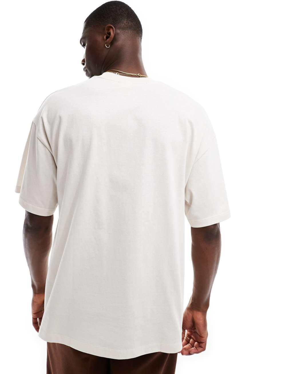 Selected Homme super oversized t-shirt with central print in cream Product Image