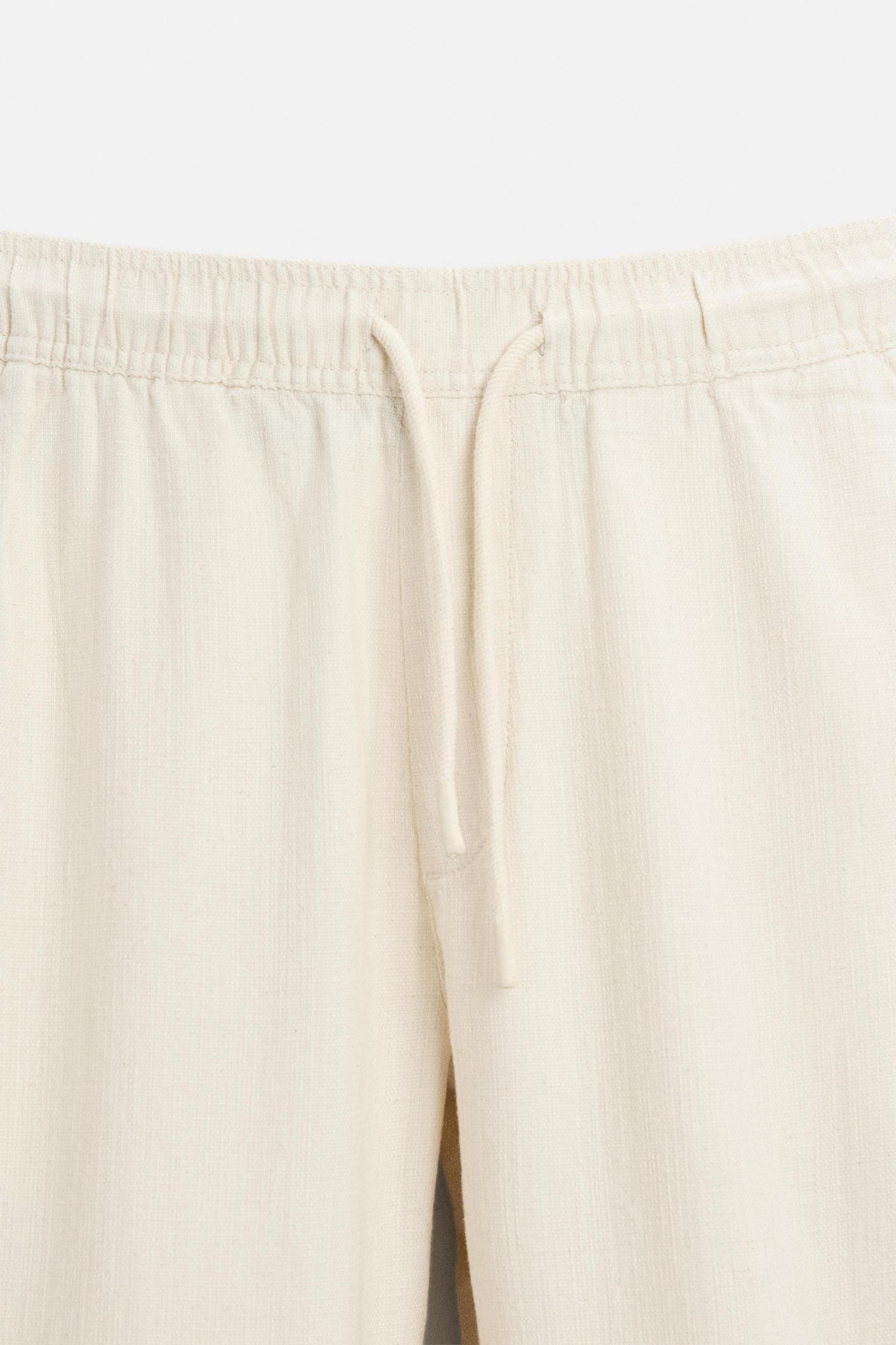 TEXTURED RELAXED FIT PANTS Product Image