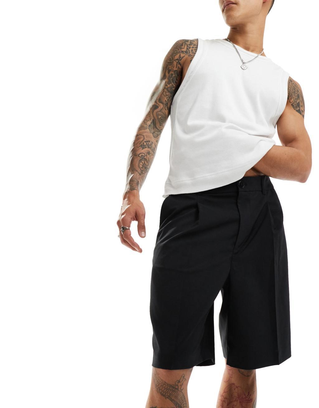 Weekday Uno loose fit tailored shorts in black Product Image