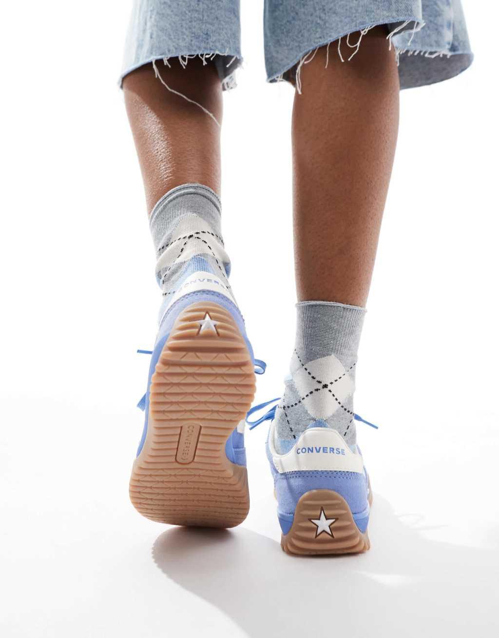Converse Run Star Sneakers in blue with white detail and gumsole Product Image