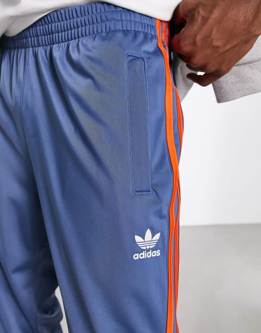 adidas Originals SPRT tricot track pants in blue and orange Product Image
