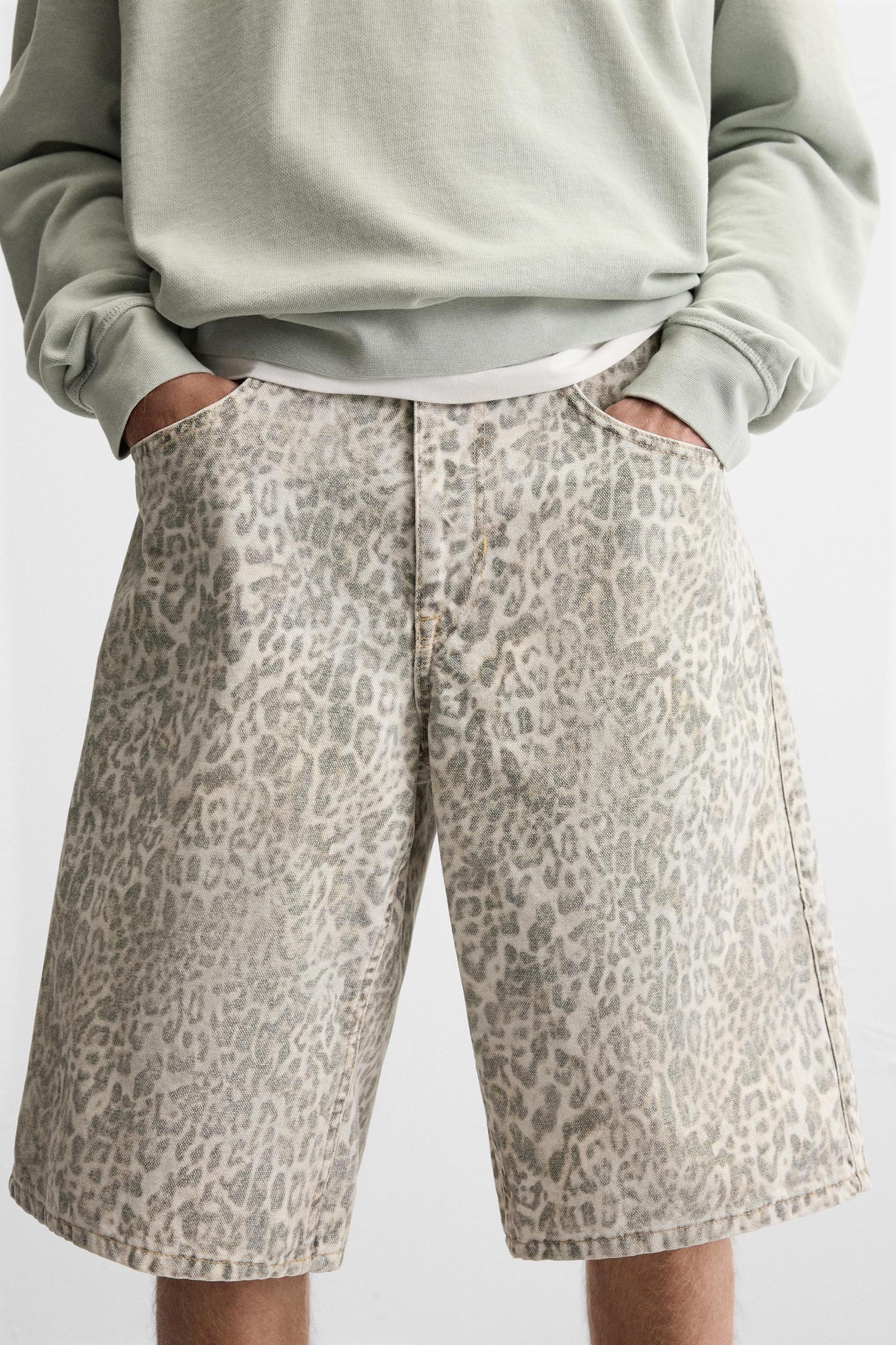 DENIM ANIMAL PRINT SHORTS Product Image