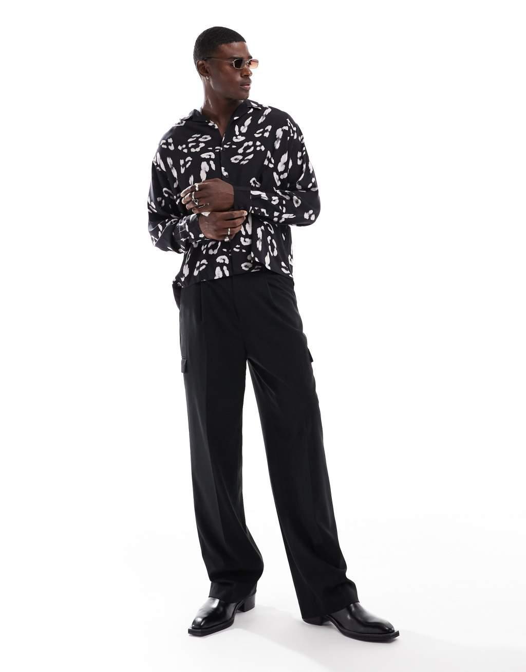ASOS DESIGN oversized revere shirt with leopard print in black Product Image